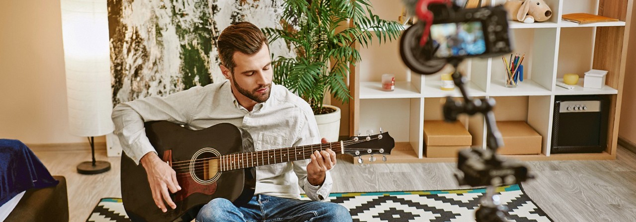 Person playing guitar