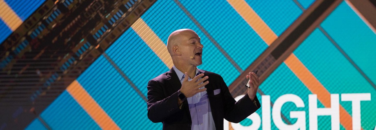 image of man talking on stage