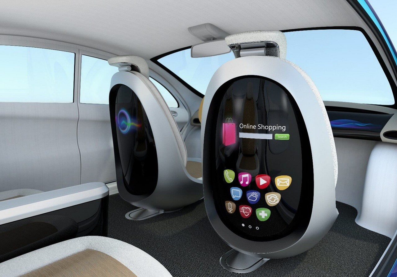 Automotive in-vehicle infotainment (IVI) systems on back of car seat 