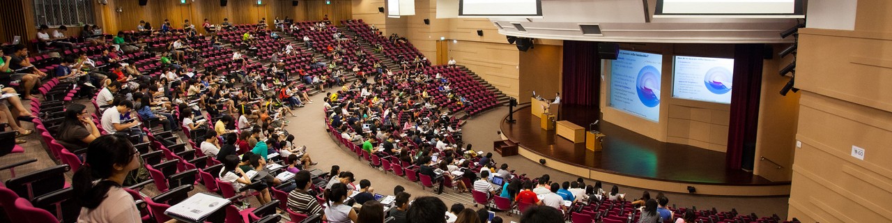 large amphitheater classroom with students