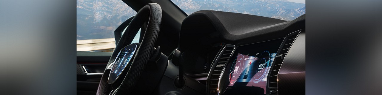headerimage-copy.jpg: photo of car steering wheel
