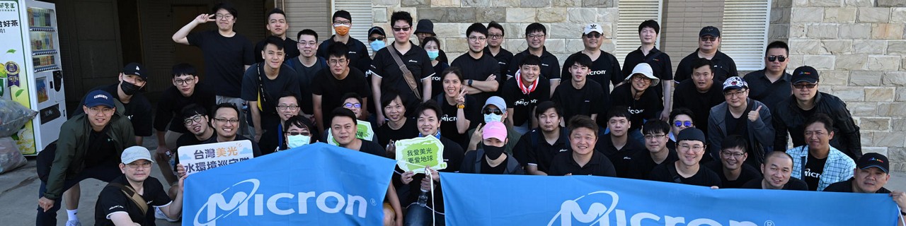 145_erg-gives-blog-post-2000x500.jpg: photo of all ERG winners holding up a Micron banner