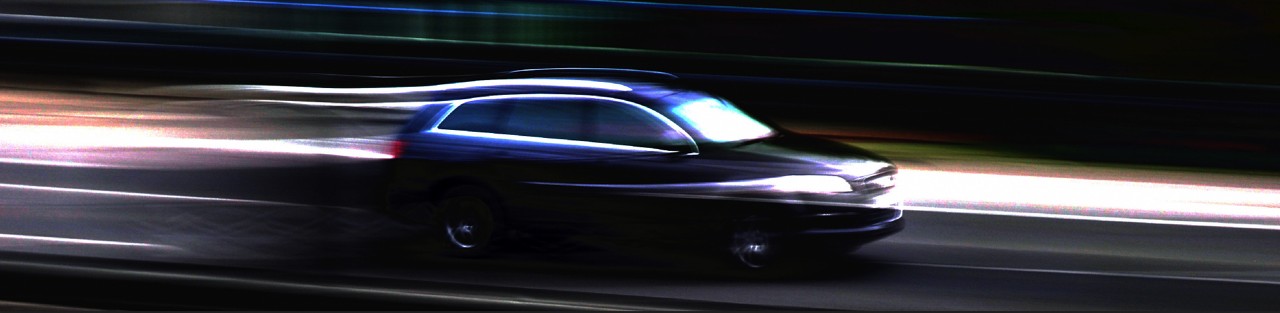 Automobile on the road at night