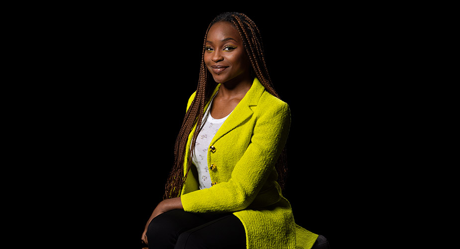 african american DEI member in black background