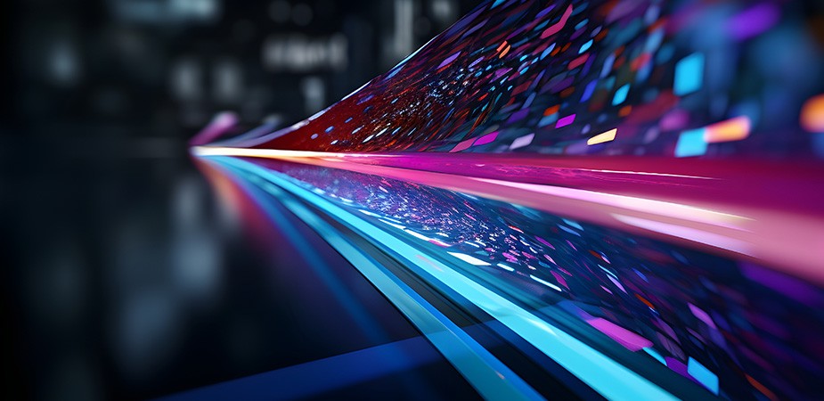 Abstract streaks of blue, pink and purple light conveying fast 5G data movement