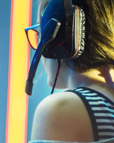 girl in front of computer playing a game